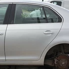 Volkswagen Jetta MK5 2005-2011 Rear Door Left Side Reflex Silver LA7W Used. Price: $208.71.