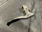 #2 1987 Suzuki LT230E Handlebar Left Lever Brake 57500-35B00 Used. Price: $29.95.