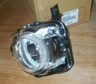 Kawasaki KFX450R Left Headlight Lens Body, Housing 23007-0094 New. Price: $118.95.