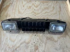 Kawasaki Bayou Headlight Assembly Used. Price: $75.00.